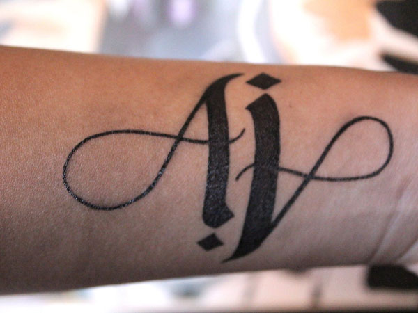 Hand Ambigram Tattoo
