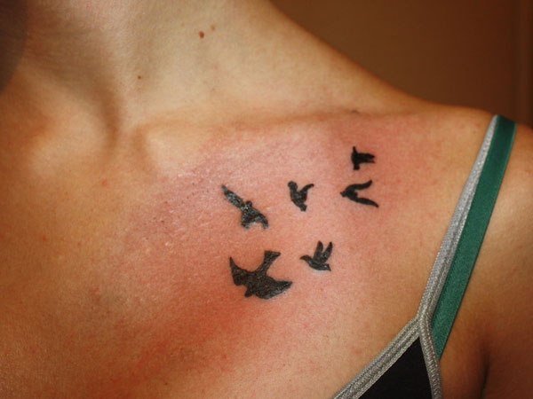 Flying Bird Silhouettes Tattoo
