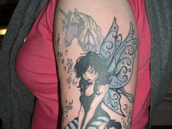 Free Spirited Unicorn Fairy Tattoo