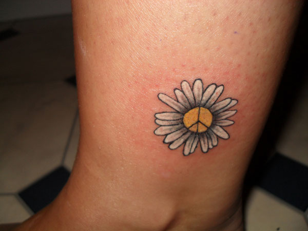 Tattoo by kiskaesse Peace flowers tattoo Flowers tattoo design Flowers  tattoo on thigh black and grey   Hippie tattoo Body art tattoos Peace  sign tattoos