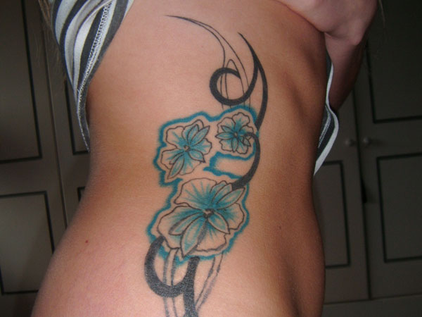 Flowery Rib Tattoo