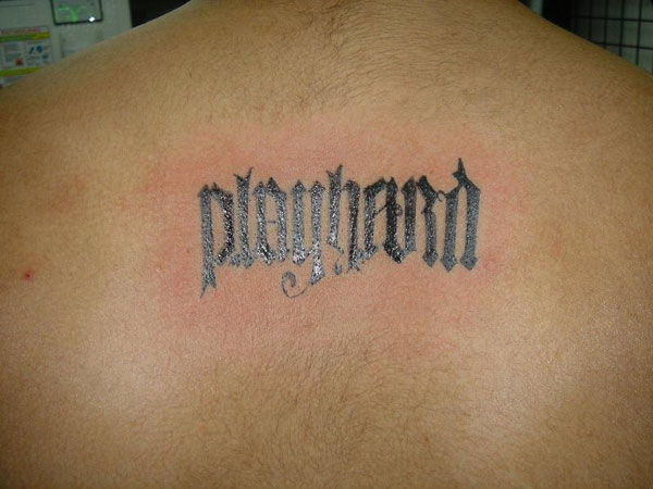 Narrow Stylized Word Tattoo
