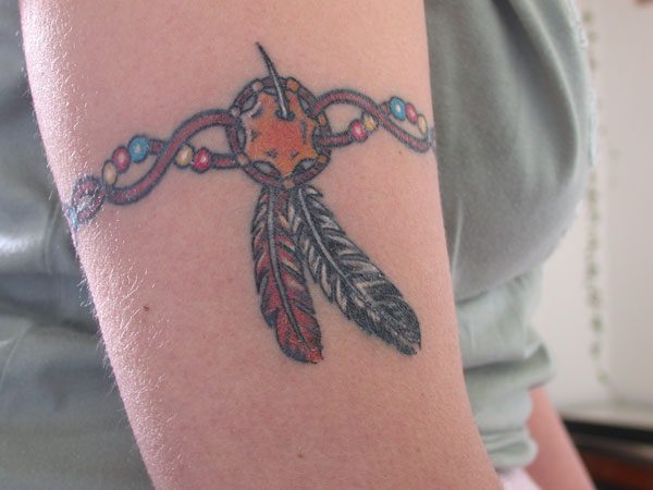 native american feather armband tattoo