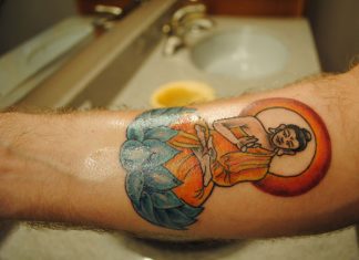 24 Religious Buddhist Tattoos For 2013