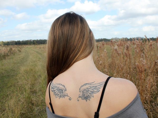 angel wings tattoos on neck