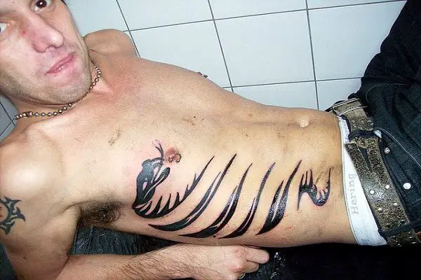 Viper Rib Tattoo
