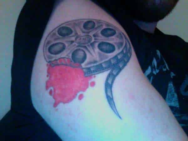 movie reel tattoo