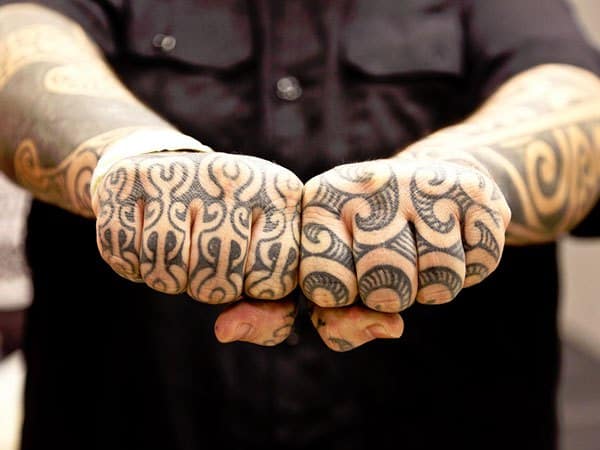 tribal knuckle tattoo