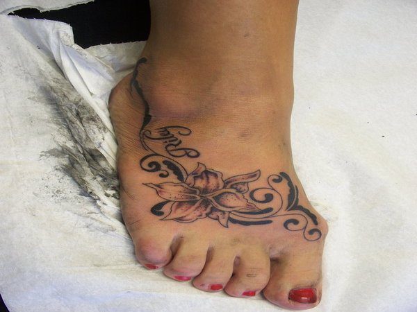 Flower and Name Foot Tattoo