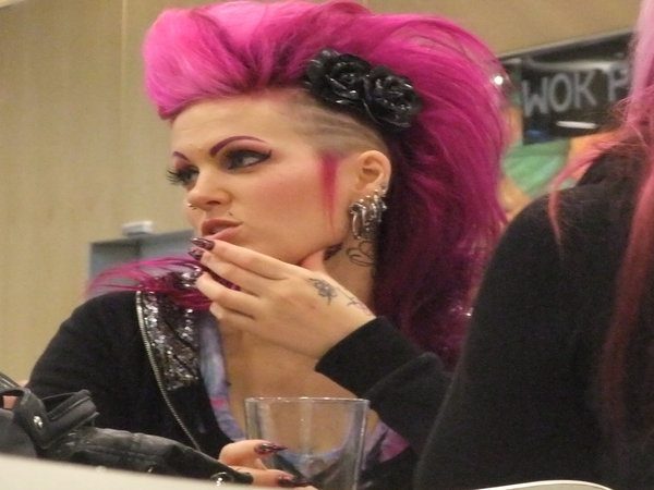 Punk Woman with Shaved Sides and Pink Hair