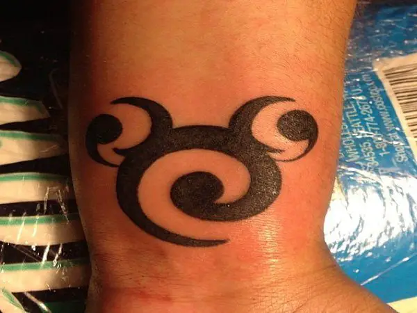 Celtic Swirl Mickey Mouse Outline Wrist Tattoo