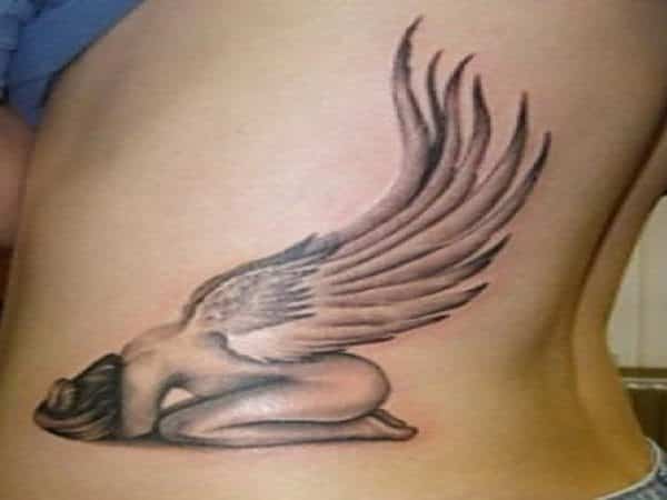 Kneeling Angel Covering Head and Wings Out Tattoo