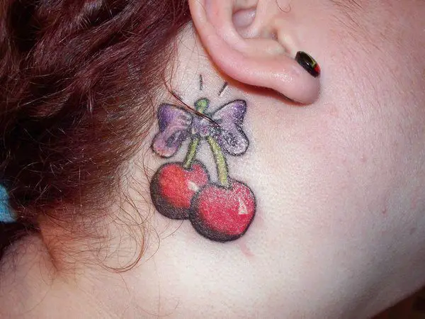 Tiny Cherries with Purple Bow Under the Ear Tattoo