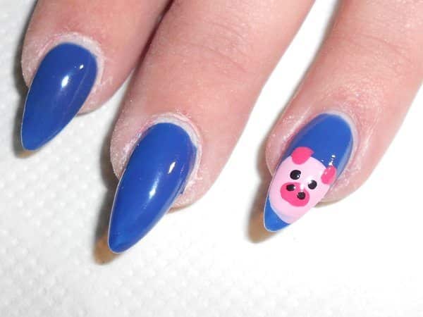 Blue Pointy Nails and Single Pink Piggie Nail