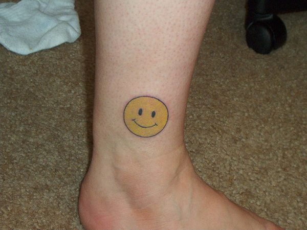 Yellow Smiley Face Ankle Tattoo