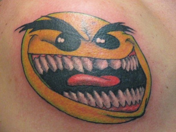 Smiley Face with Scary Smile Tattoo