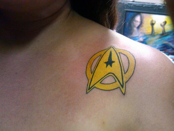Yellow Star Trek Insignia Shoulder Tattoo
