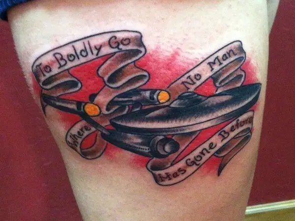 Enterprise Tattoo with Words On Sash and Red Coloring