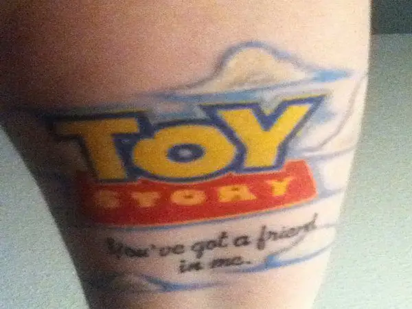 Toy Story Logo Tattoo with You Got A Friend In Me Words