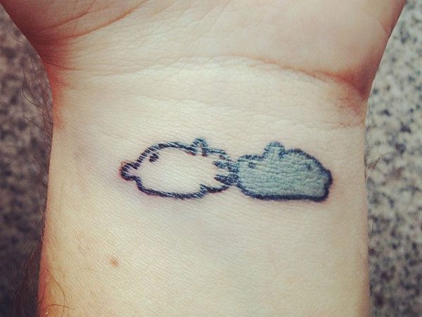 Two Tiny Grey and White Bunny Wrist Tattoos