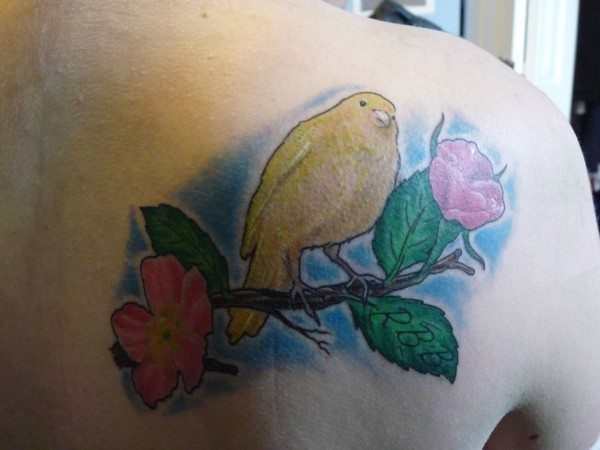 Yellow Sparrow Tattoo with Pink Flowers