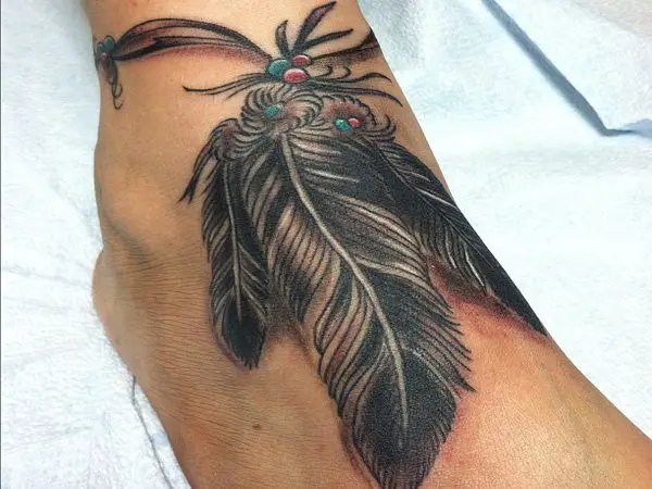 Native American Long Feather Ankle Tattoo with Red and Blue Beads and Leather Tie
