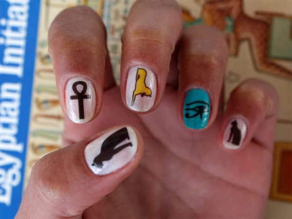 White Nails with Egyptian Cats, Ankh, Sphinx, and one Blue Eye of Horus Nail