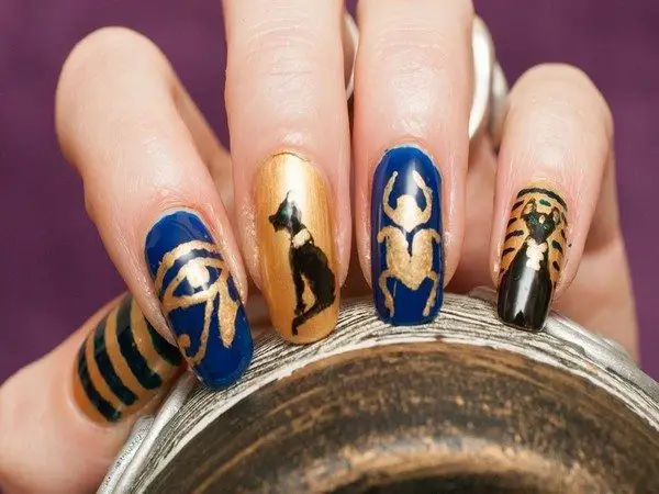 Blue, Gold, and Black Nails with Egyptian Symbols