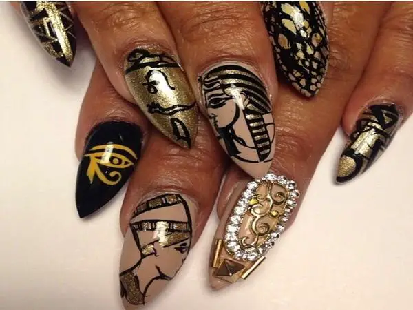 Black, Gold, and Tan Nails with Eye of Horus, Egyptian Pharoahs, and other Egyptian Symbols