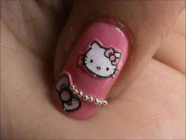 Pink Nails with Hello Kitty, a Pink Ribbon, and Pink Pearls