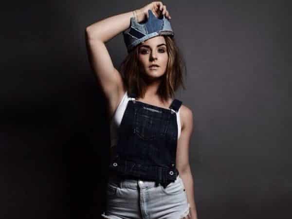 Jojo Wearing a Crown and Overalls