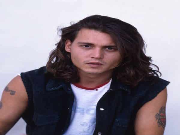 Young Johnny Depp with Shoulder Length Brunette Wavy Hair