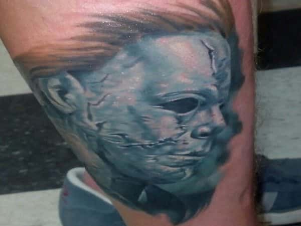 Colored Michael Myers Mask Tattoo with Brown Hair