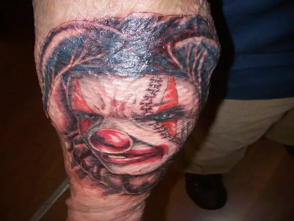 Scary Clown Arm Tattoo