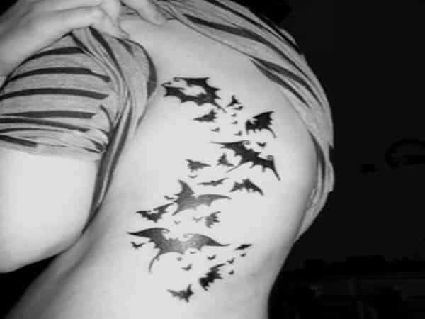 Flying Bats Going Down the Side Tattoo