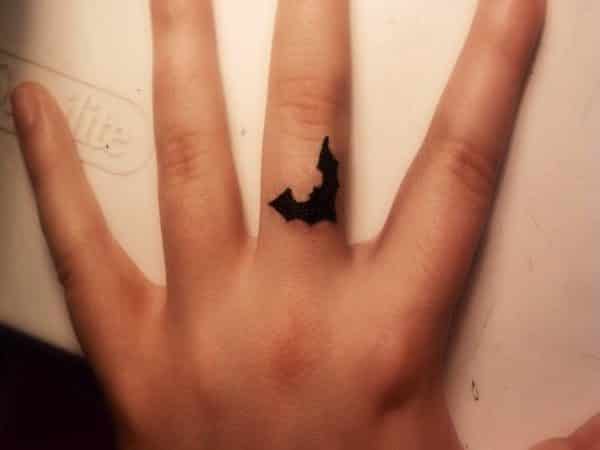 iny Bat Finger Tattoo