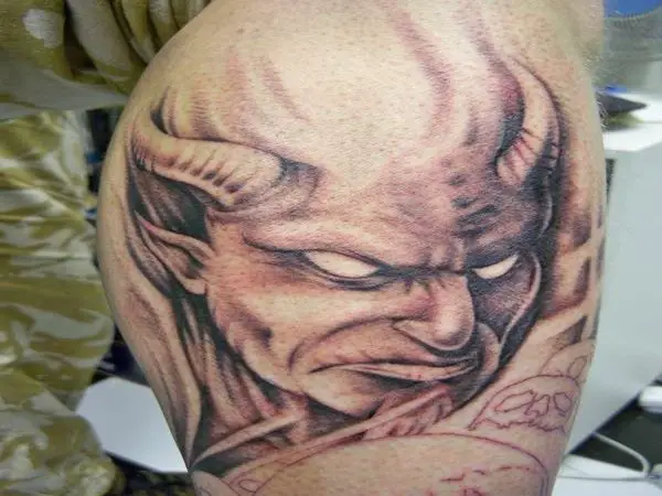 Grey Ink Devil Tattoo