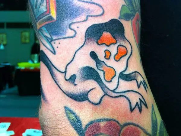 Squiggly Ghost with Orange Eyes and Mouth Tattoo