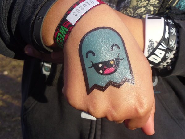Blue Ghost Top of Hand Tattoo