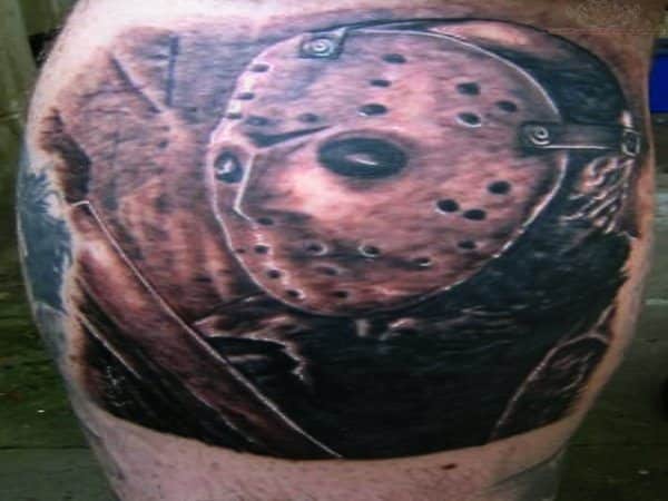 Jason Voorhees Profile with Machete Tattoo with Dark Ink