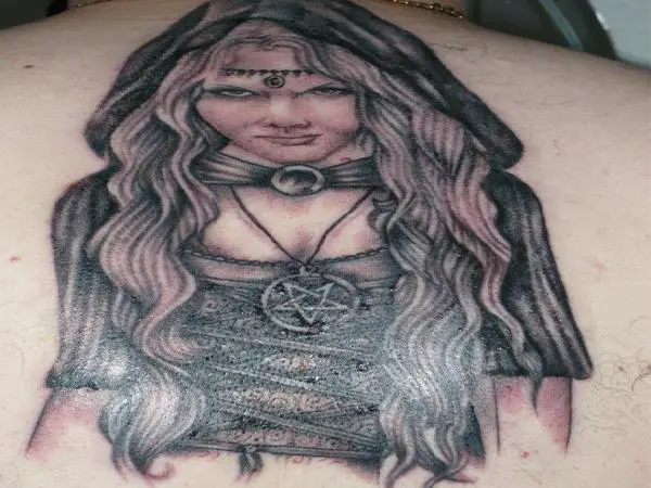 Black Ink Witch with Long Hair, Cloak, and Pentagram Necklace