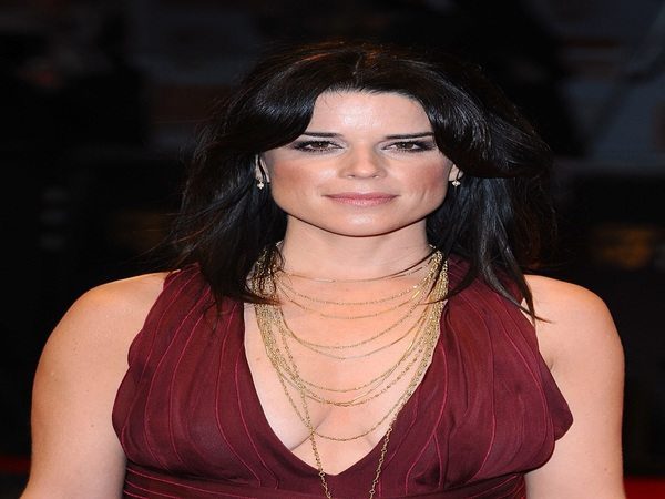 Neve Campbell Shoulder Length Hair with Curly Parted Bangs