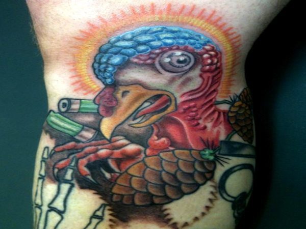 Colored Turkey Head Tattoo with Bullets and Pine Cones