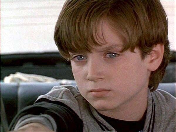 Young Elijah Wood with Light Brown Short Hair