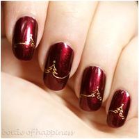 11 Beautiful Red and Gold Nail Designs Red-and-gold-nails-200by200
