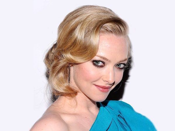 Amanda Seyfried Bun with Side Swept Curly Bangs