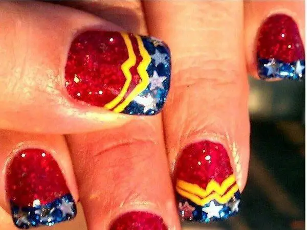 Red Glitter Nails with the Wonder Woman Symbol, Blue Tips, and Silver Stars