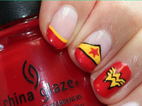 Plain Nails with Red Tips, a Yellow Tiara, and One Red Nail with Wonder Woman Symbol