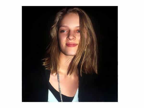 Young Uma Thurman with Shoulder Length Straight Brown Hair