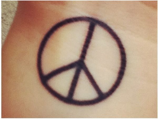 Simple Peace Sign Wrist Tattoo